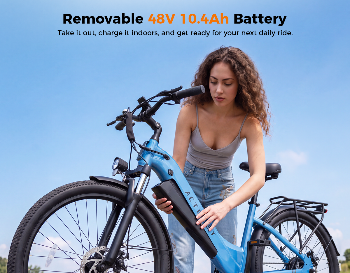 A woman stands beside a light blue electric bicycle outdoors under a clear blue sky, holding the battery mounted on the frame. Text at the top reads 'Removable 48V 10Ah.