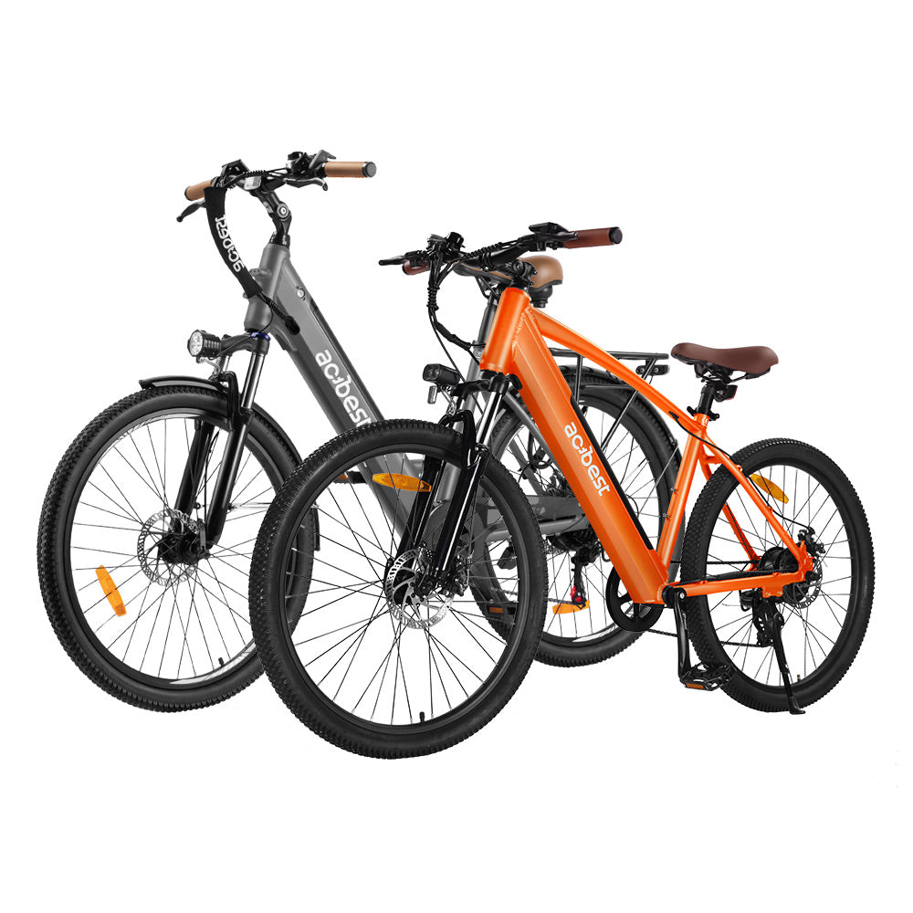 Gray and orange electric bikes with modern designs for urban commuting.