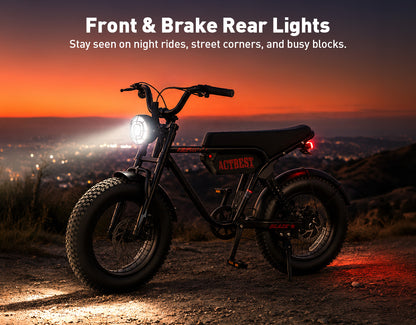 A black Actbest fat-tire electric bicycle shown outdoors at sunset on a dirt path, with its front headlight illuminated and a red rear light visible. White marketing text at the top reads 'Front & Brake Rear Lights' and 'Stay seen on night rides, street corners, and busy blocks.