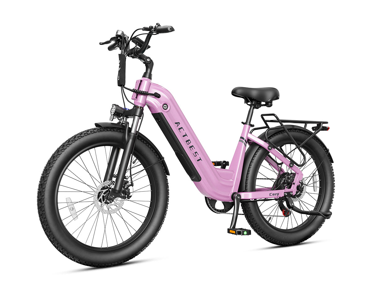 Actbest Cozy pink electric commuter bike with step-through frame, fat tires, fenders, and rear cargo rack